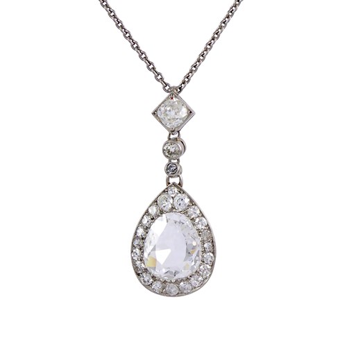 Early 20th century old cut diamond drop cluster pendant, c.1915, with a principal old cut diamond of pear shaped outline,